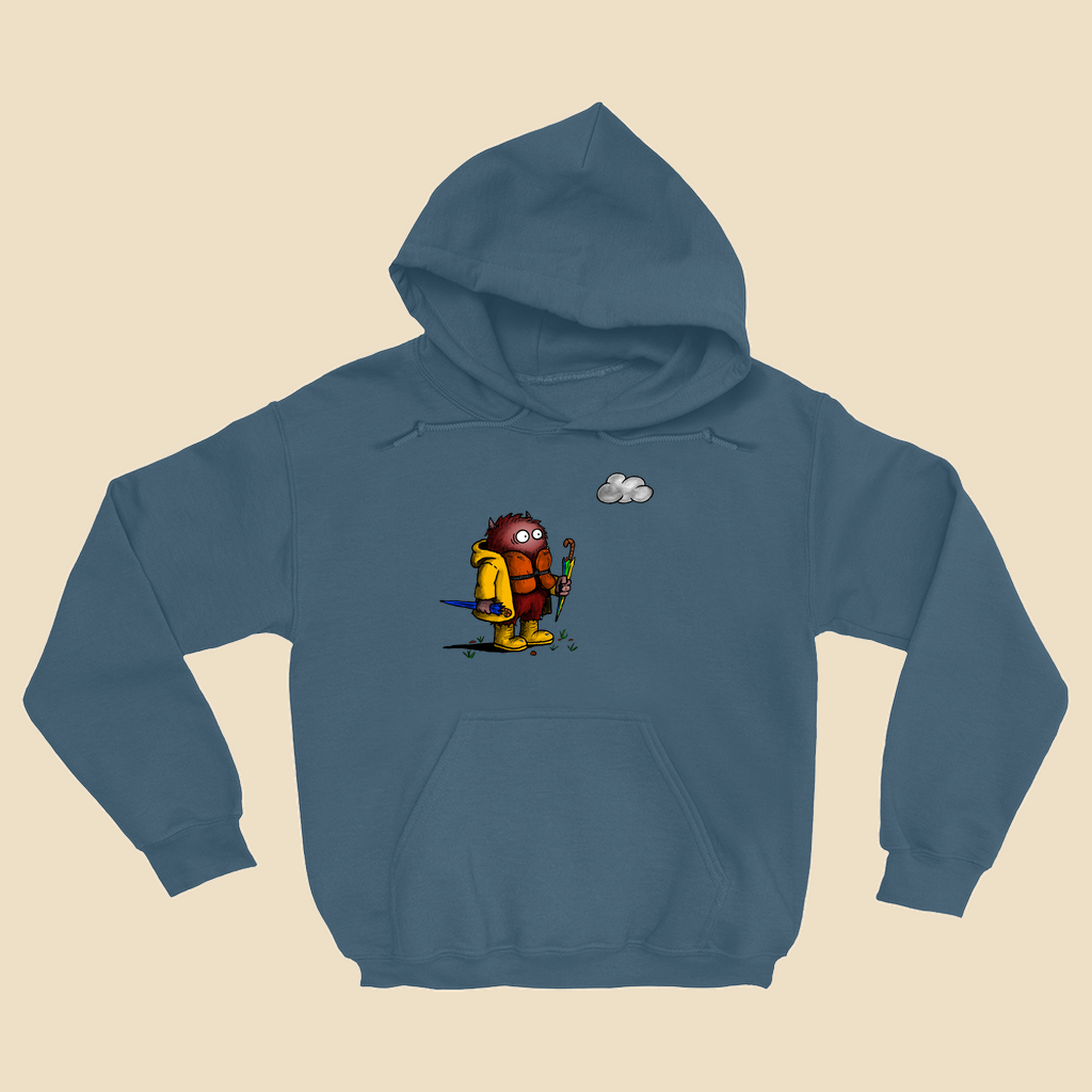 Hoodie featuring a cartoon creature wearing a raincoat, life jacket, and rain boots while carrying two umbrellas and staring nervously at a single cloud overhead.