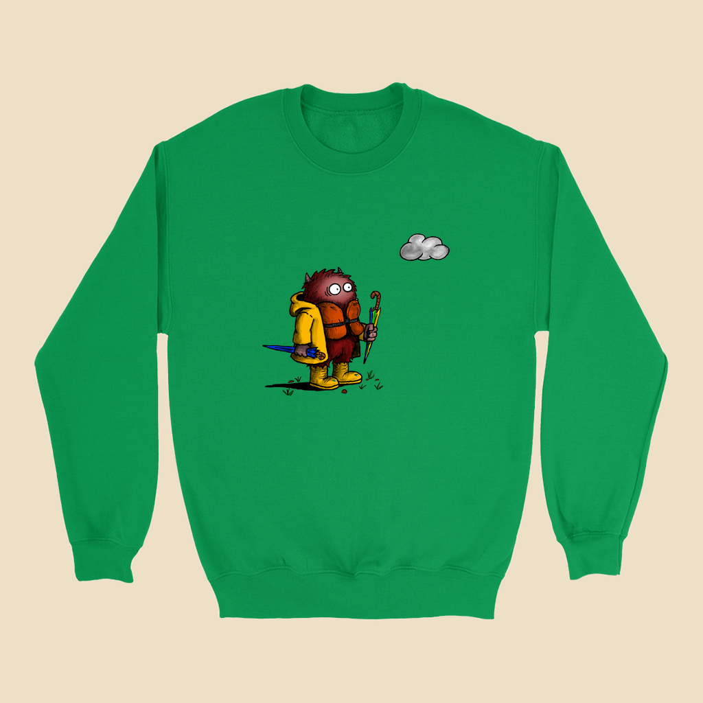 Sweatshirt featuring a cartoon creature wearing a raincoat, life jacket, and rain boots while carrying two umbrellas and staring nervously at a single cloud overhead.