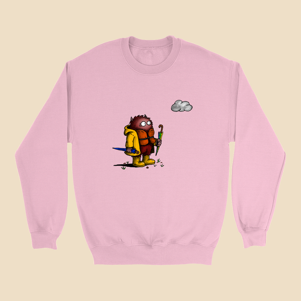 Sweatshirt featuring a cartoon creature wearing a raincoat, life jacket, and rain boots while carrying two umbrellas and staring nervously at a single cloud overhead.