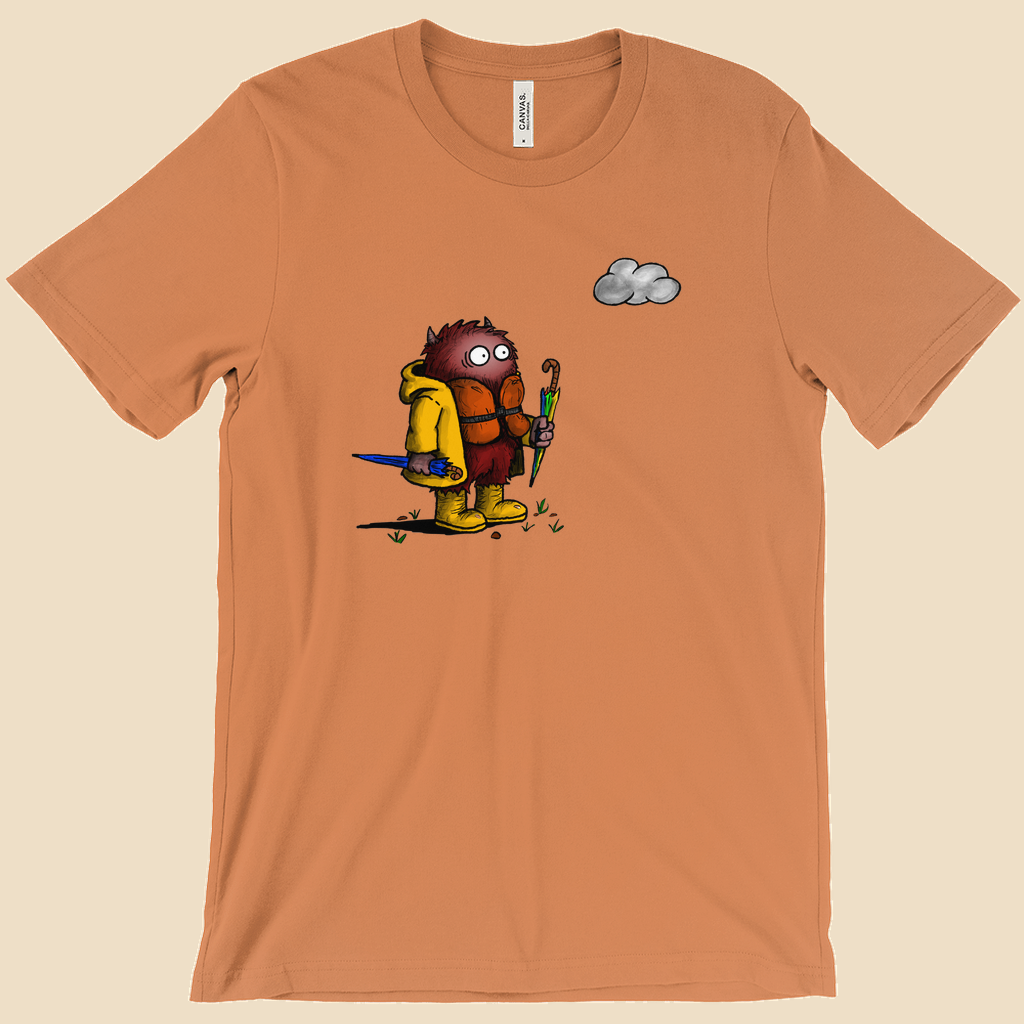 Abundance of Caution T-shirt featuring a cartoon creature wearing a raincoat, life jacket, and rain boots while carrying two umbrellas and staring nervously at a single cloud.