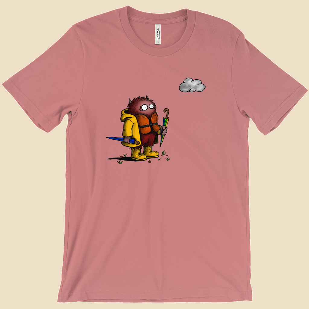Abundance of Caution T-shirt featuring a cartoon creature wearing a raincoat, life jacket, and rain boots while carrying two umbrellas and staring nervously at a single cloud.