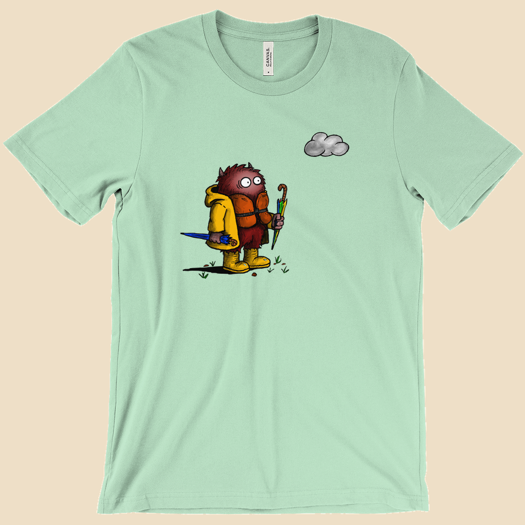 Abundance of Caution T-shirt featuring a cartoon creature wearing a raincoat, life jacket, and rain boots while carrying two umbrellas and staring nervously at a single cloud.