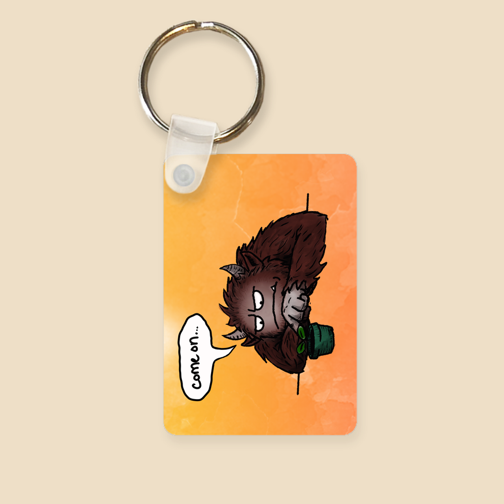 Can’t Rush Growth keychain featuring a brown furry monster impatiently watching a small green potted plant and saying “come on...”
