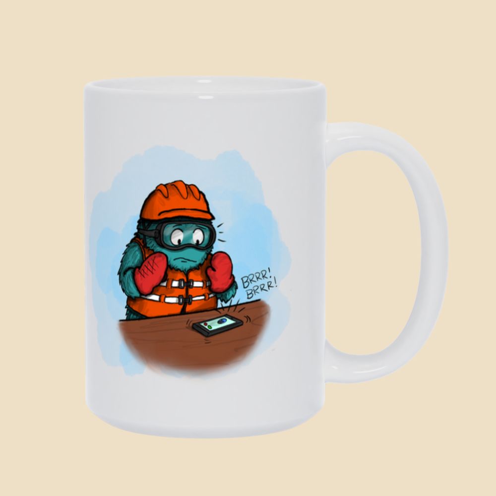Mug featuring a furry monster wearing lots of safety gear and panicking as an unexpected phone call comes in.