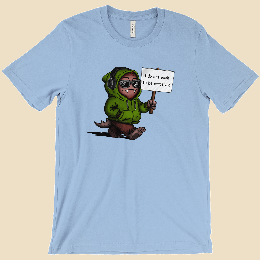 I Do Not Wish To Be Perceived T-shirt featuring a furry monster wearing sunglasses and headphones while holding a sign that reads “I do not wish to be perceived.”