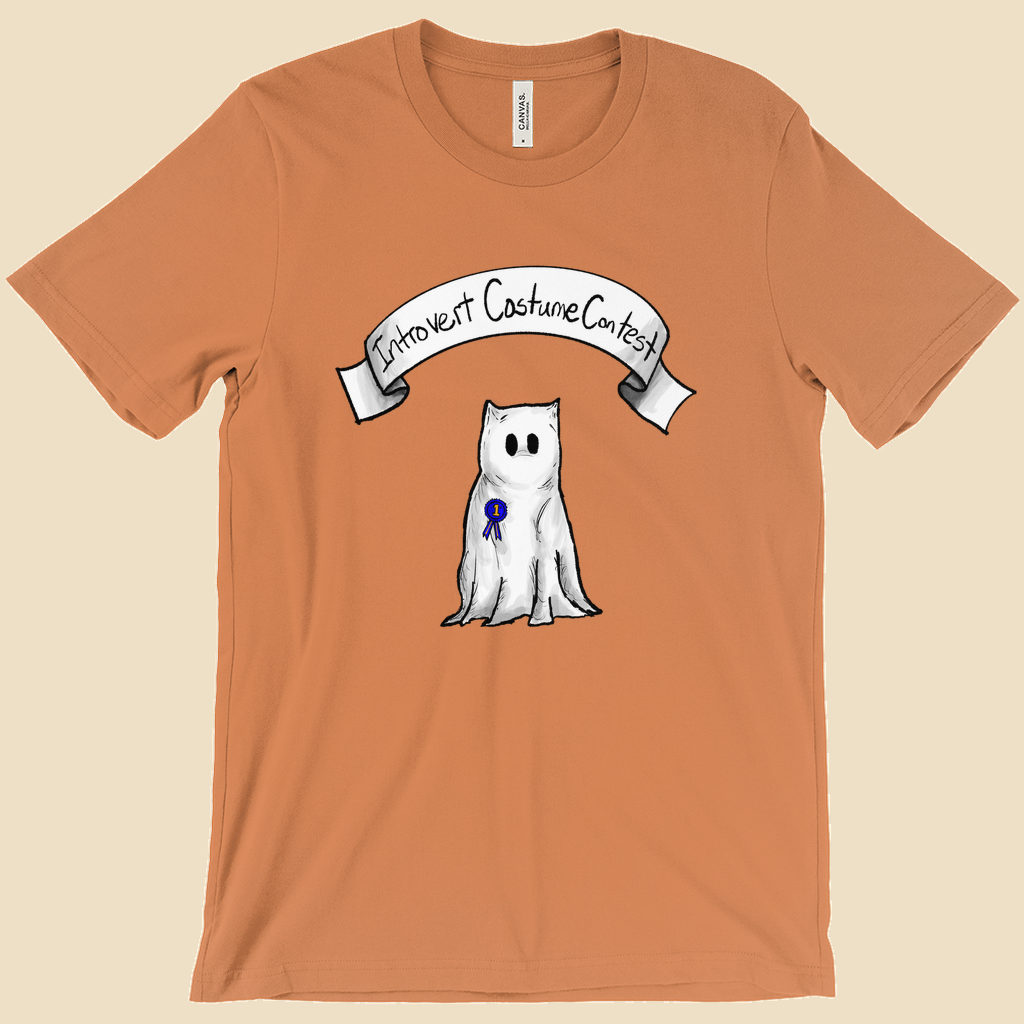 Introvert Costume Contest T-shirt featuring a shy monster dressed as a ghost beneath a banner and wearing a first-place ribbon.