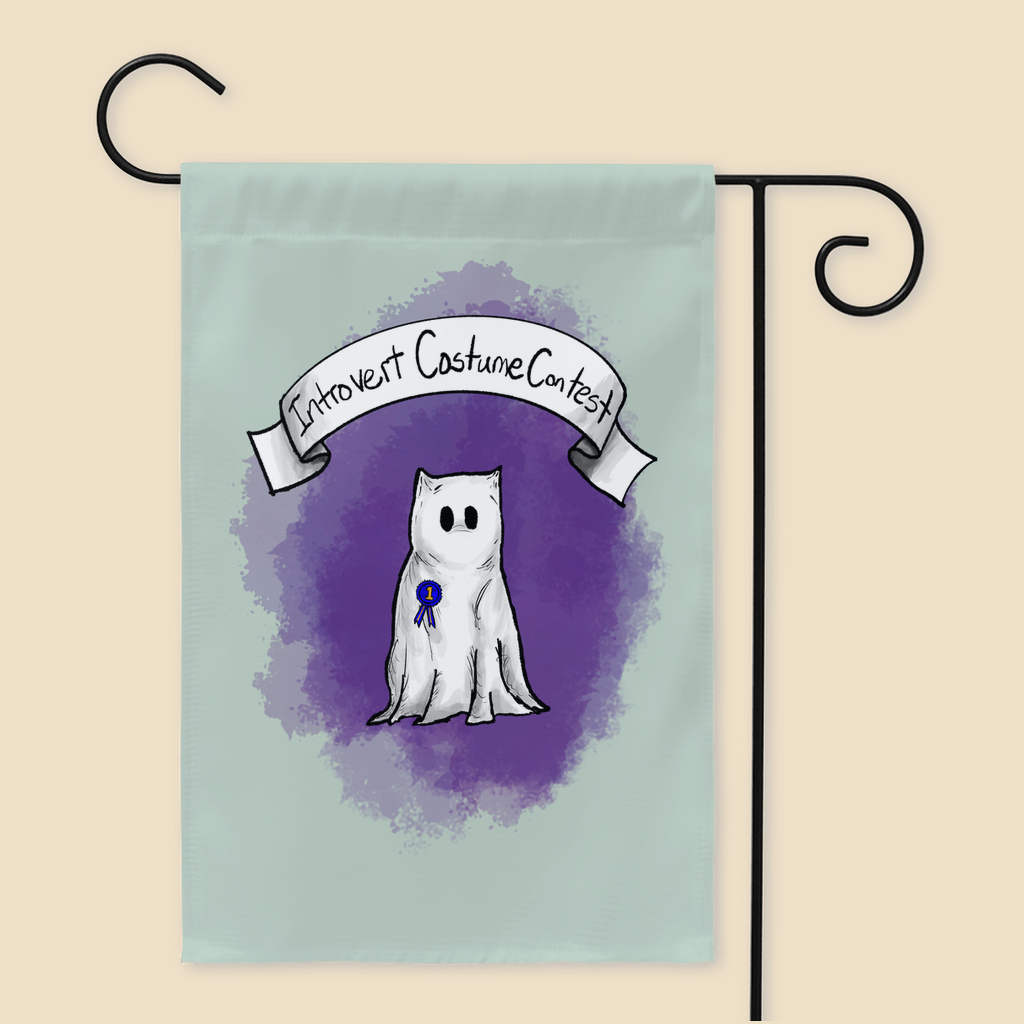 Introvert Costume Contest yard flag featuring a shy monster dressed as a ghost beneath a banner and wearing a first-place ribbon against a purple background.