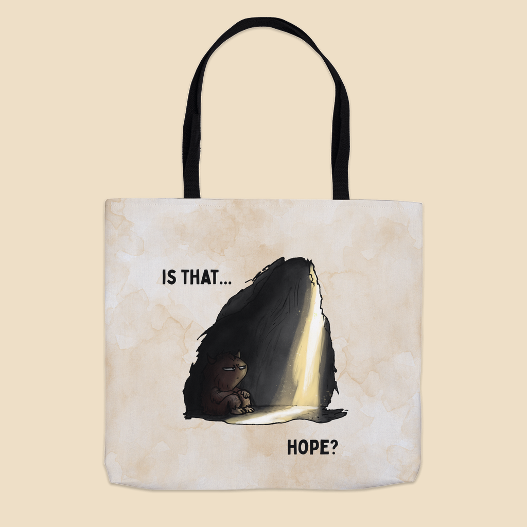 Is That Hope mental health humor tote bag featuring a tired brown monster sitting in a dark cave as a beam of warm light breaks through, with the words “Is That... Hope?”