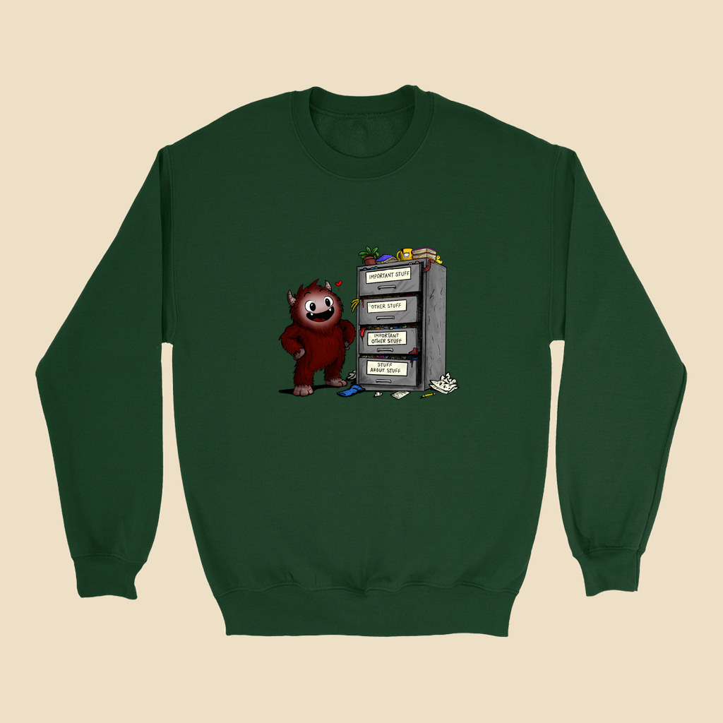 Sweatshirt featuring a smiling cartoon creature proudly standing beside an overflowing filing cabinet with drawers labeled "Important Stuff," "Other Stuff," "Important Other Stuff," and "Stuff About Stuff."
