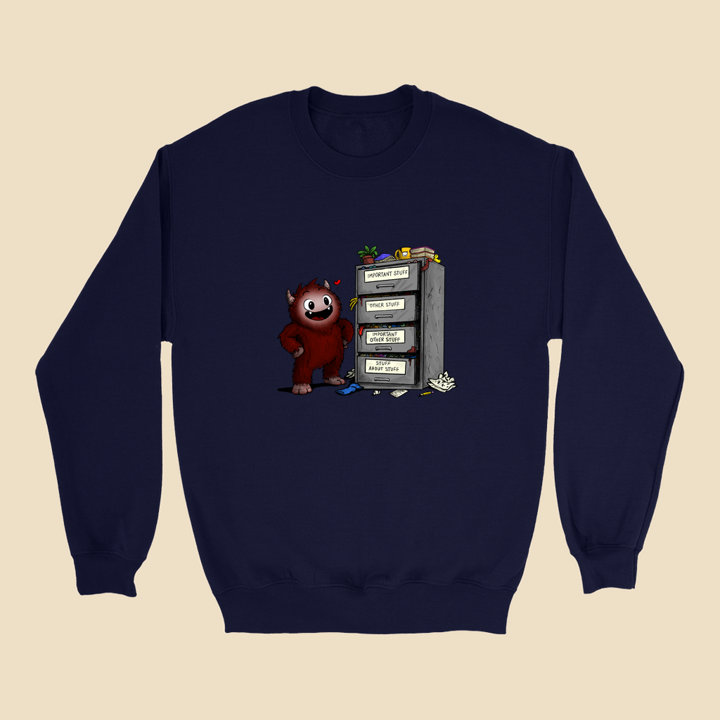 Sweatshirt featuring a smiling cartoon creature proudly standing beside an overflowing filing cabinet with drawers labeled "Important Stuff," "Other Stuff," "Important Other Stuff," and "Stuff About Stuff."
