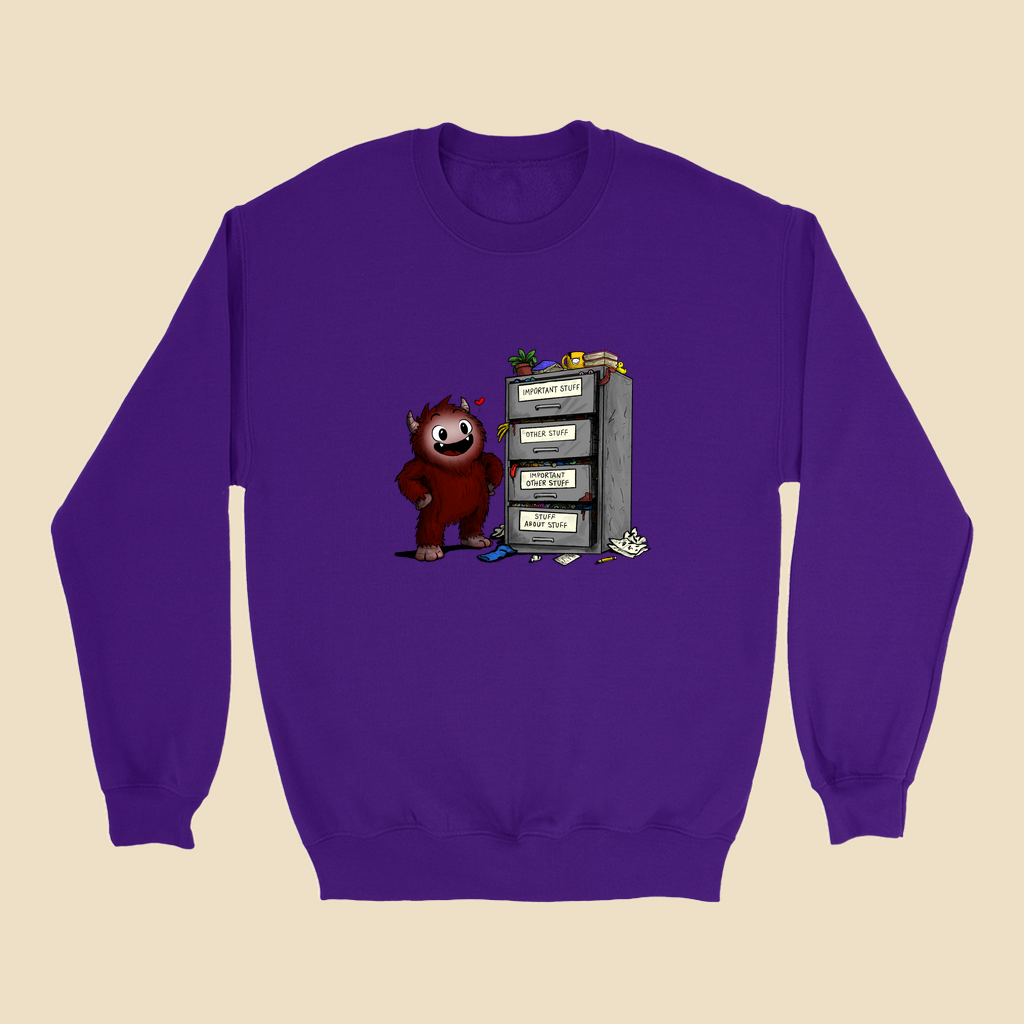 Sweatshirt featuring a smiling cartoon creature proudly standing beside an overflowing filing cabinet with drawers labeled "Important Stuff," "Other Stuff," "Important Other Stuff," and "Stuff About Stuff."