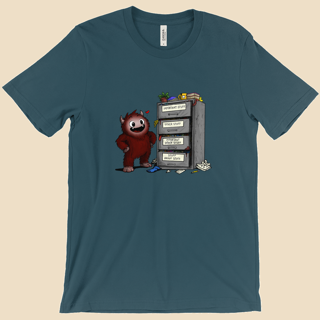 T-shirt featuring a smiling cartoon creature proudly standing beside an overflowing filing cabinet with drawers labeled "Important Stuff," "Other Stuff," "Important Other Stuff," and "Stuff About Stuff."
