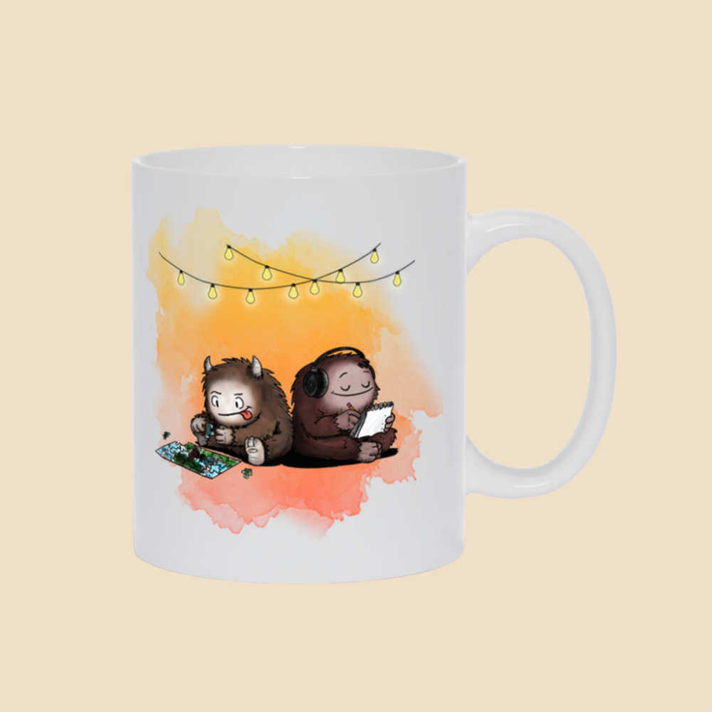 Mug featuring two cartoon creatures sitting back to back beneath string lights, one working on a puzzle and the other writing in a notebook.