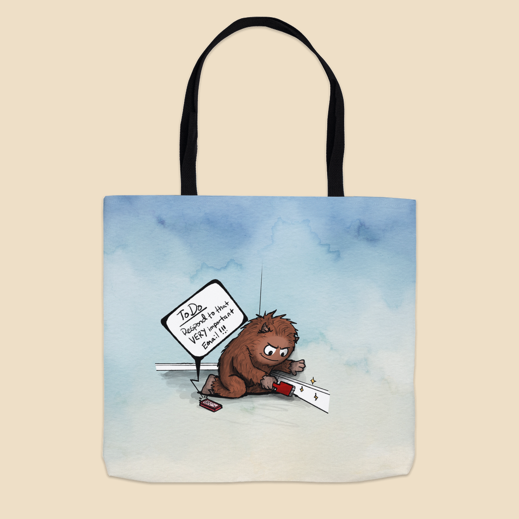 Tote bag featuring a brown furry monster sitting on the floor cleaning a baseboard while a phone reminds him to respond to an important email.