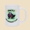 White mug featuring the “Snacks and Contingency Plans” anxiety humor design with a purple monster dressed like a superhero and carrying pouches of backup supplies.