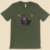 Snacks and Contingency Plans anxiety humor T-shirt featuring a purple monster wearing a utility belt packed with colorful snacks and supplies.