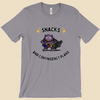 Snacks and Contingency Plans anxiety humor T-shirt featuring a purple monster wearing a utility belt packed with colorful snacks and supplies.