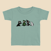Toddler T-shirt featuring a group of furry monsters dressed in Halloween costumes, including a witch, Frankenstein’s monster, a devil, and a ghost.