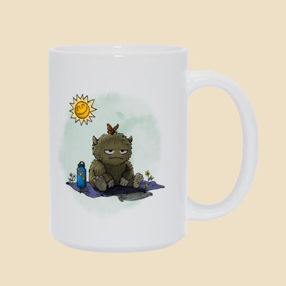 Mug featuring a furry monster sitting miserably in the sunshine while the cheerful world around it enjoys a beautiful day.