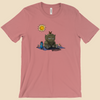 T-shirt featuring a furry monster sitting miserably in the sunshine while the cheerful world around it enjoys a beautiful day.