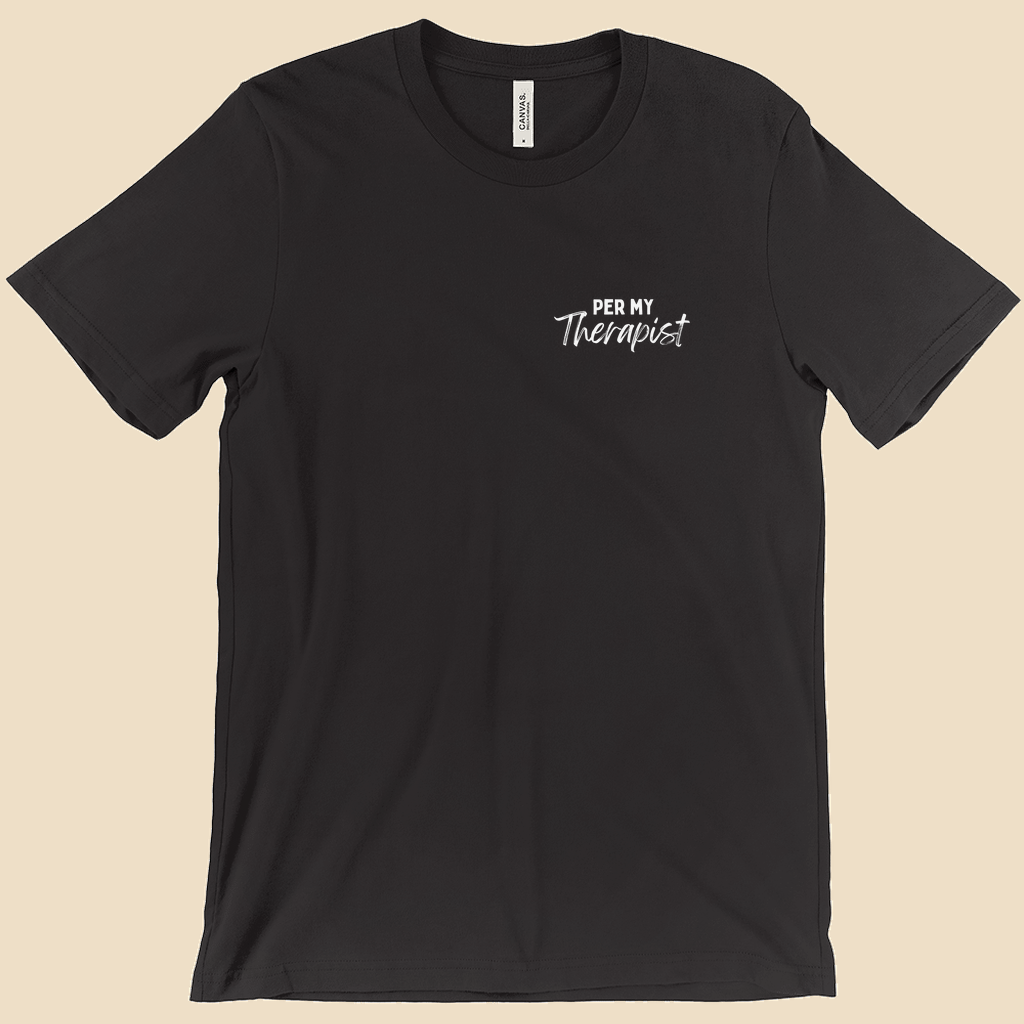 Per My Therapist T-shirt with small white Per My Therapist logo on the front chest and a large Arnold therapist illustration on the back with the words “We’ve Discussed This.”