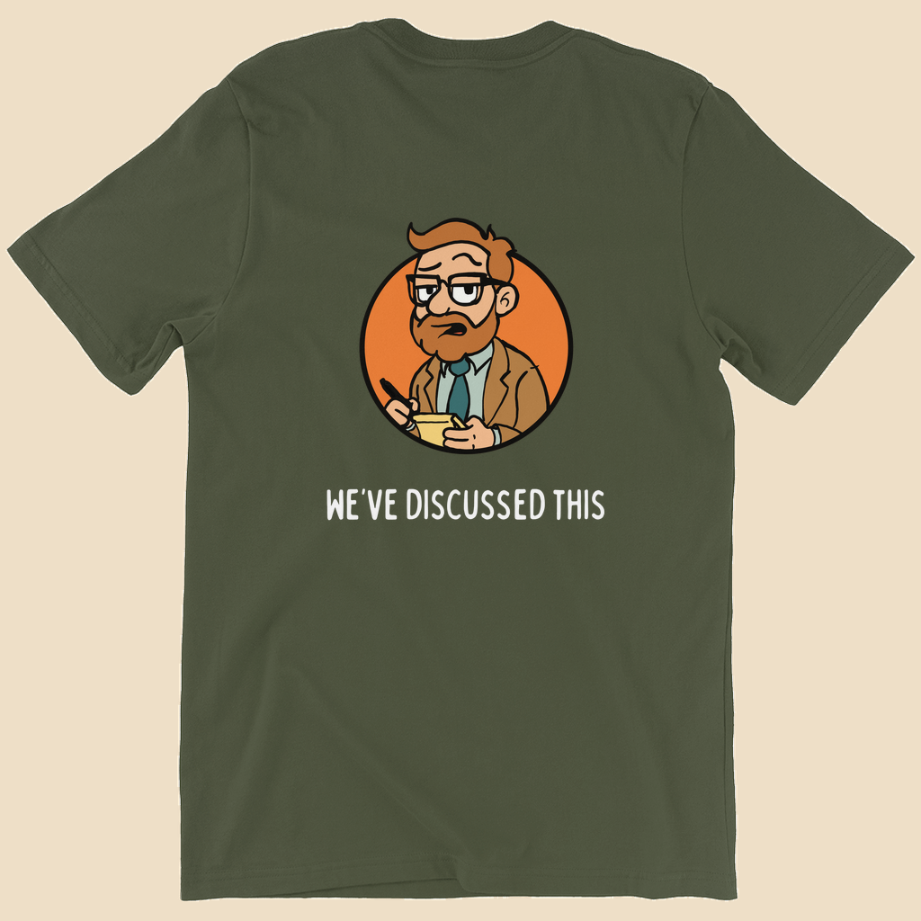 Per My Therapist T-shirt with small white Per My Therapist logo on the front chest and a large Arnold therapist illustration on the back with the words “We’ve Discussed This.”