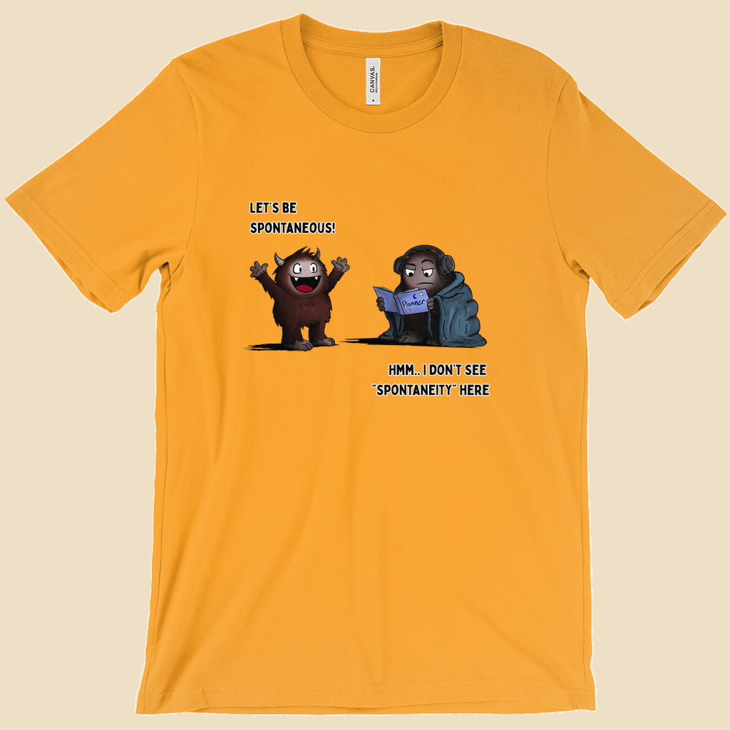 T-shirt featuring two cartoon creatures, one saying “Let’s be spontaneous!” while the other checks a planner and replies, “Hmm... I don’t see ‘spontaneity’ here.”