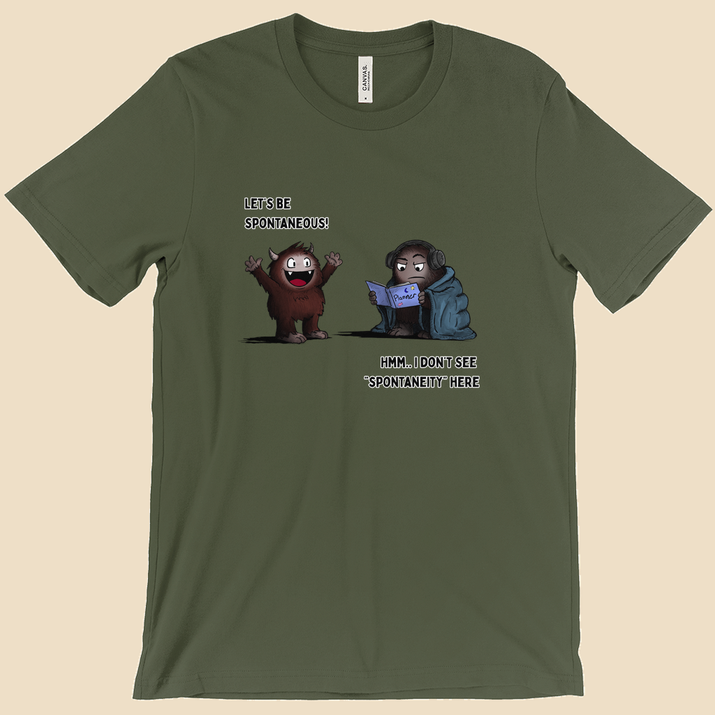 T-shirt featuring two cartoon creatures, one saying “Let’s be spontaneous!” while the other checks a planner and replies, “Hmm... I don’t see ‘spontaneity’ here.”