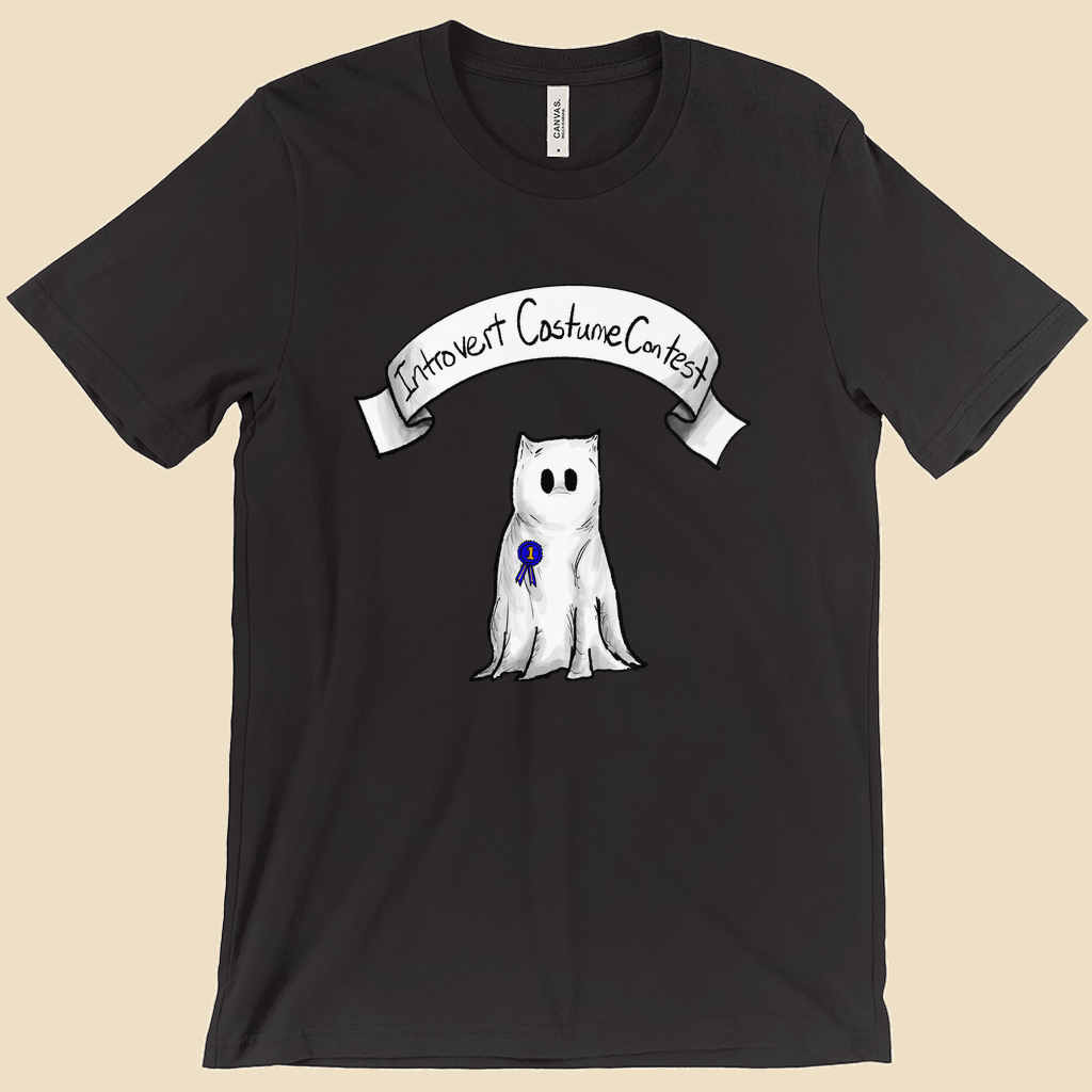 Introvert Costume Contest T-shirt featuring a shy monster dressed as a ghost beneath a banner and wearing a first-place ribbon.