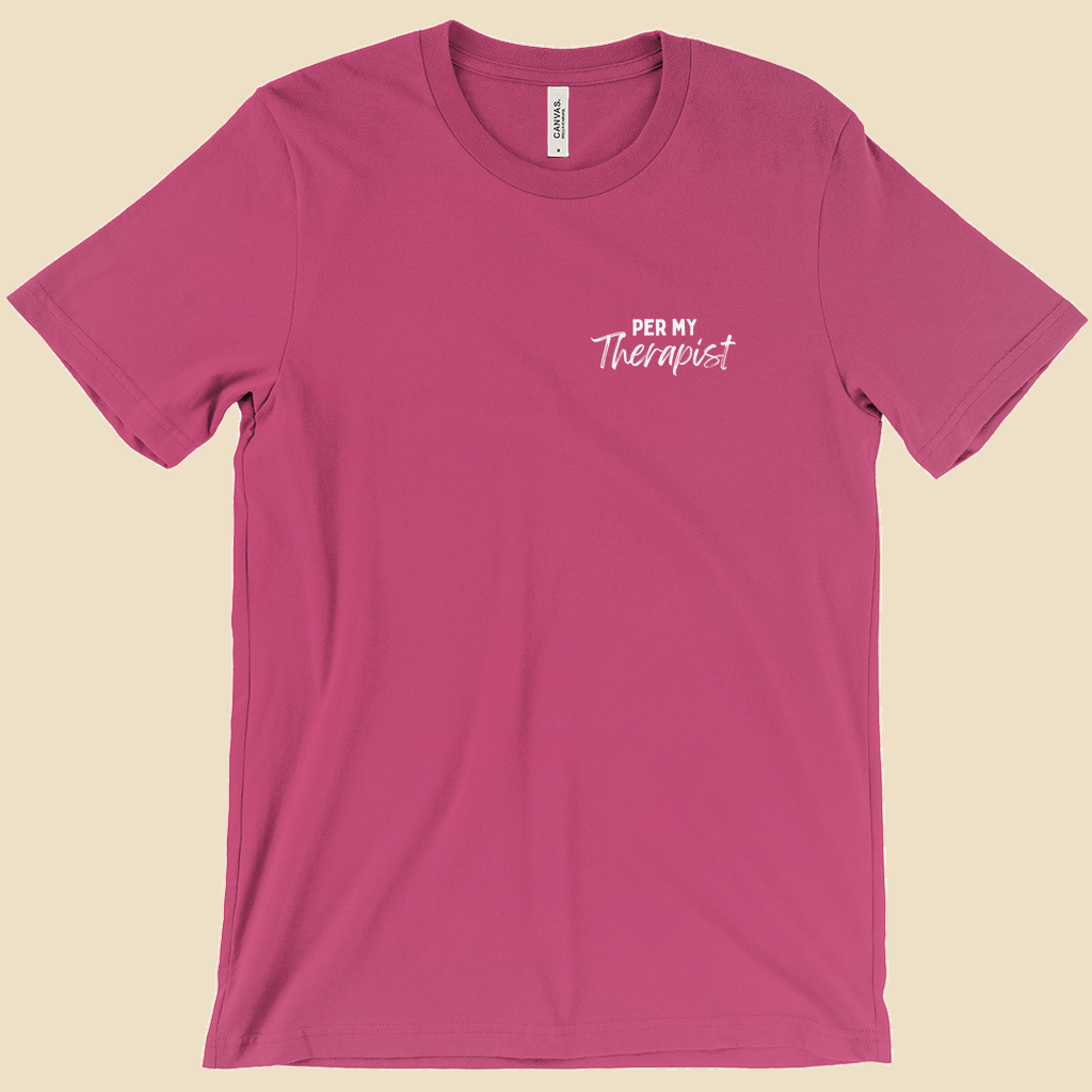 Per My Therapist T-shirt with small white Per My Therapist logo on the front chest and a large Arnold therapist illustration on the back with the words “We’ve Discussed This.”